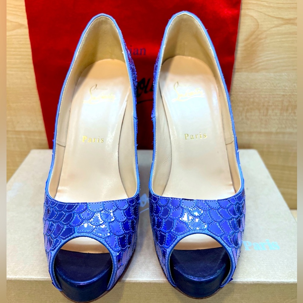 Purple louboutin heels